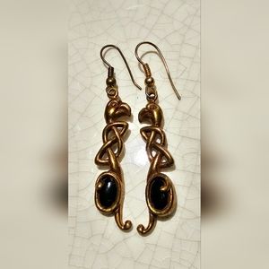 Vintage Egyptian Revival bronze eagle design with black stone, bohemian luxury